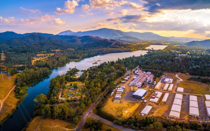 Aerial panorama of Goulburn River and mountains at sunset. Eildon, Victoria, Australia